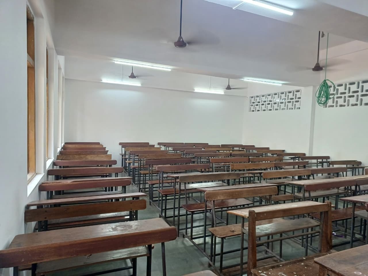 A second Junior College lecture room, its bench desks in rows facing the teaching wall.