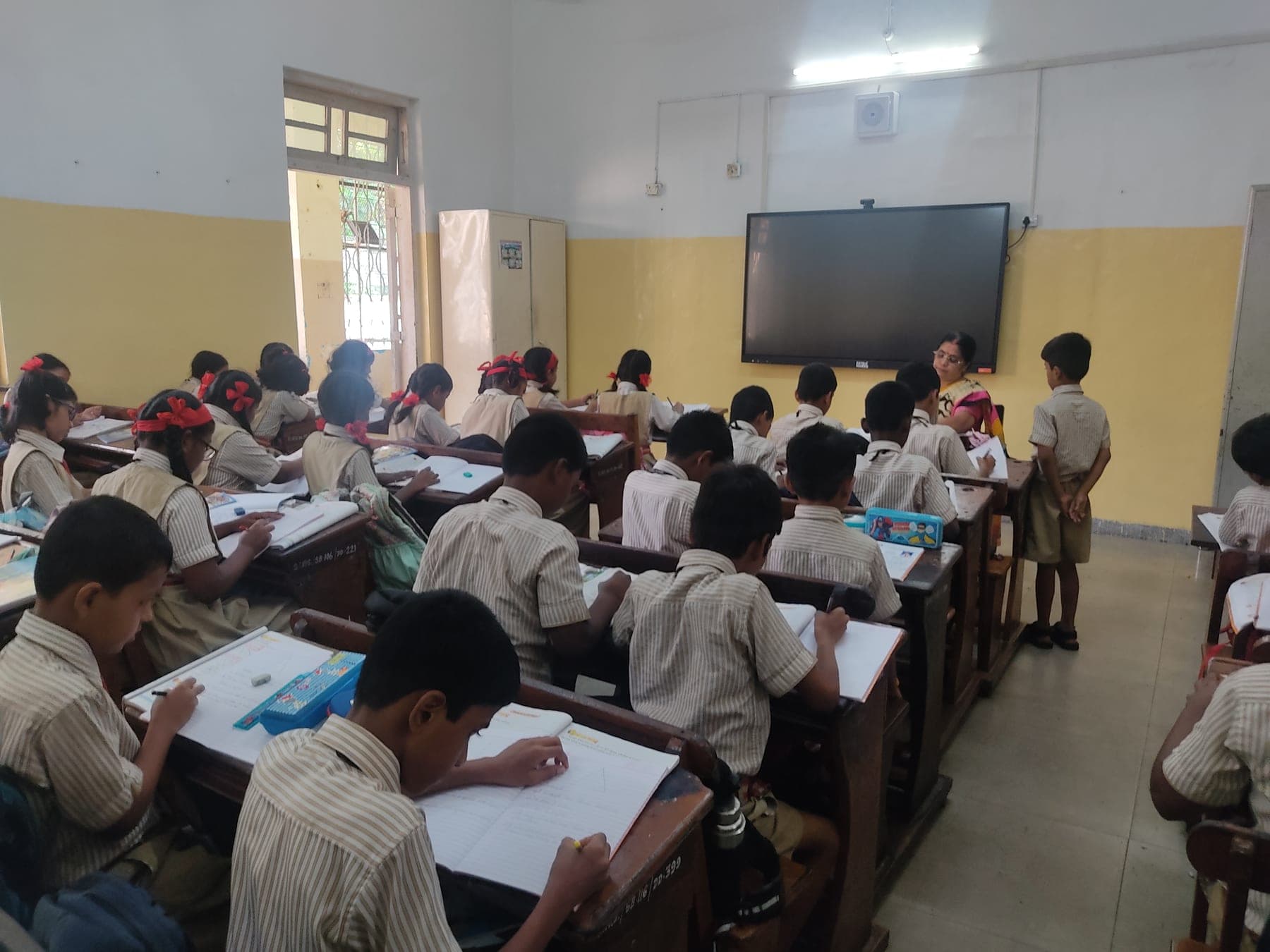 A Primary academic session in progress.